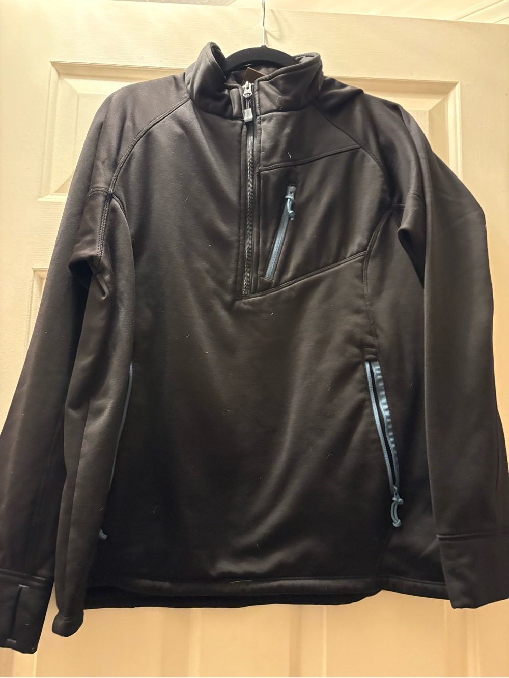 Women's Black Long-Sleeve Quarter-Zip Top with Chest and Hand Pockets